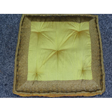 Floor cushion with bright yellow edges in gold brocade