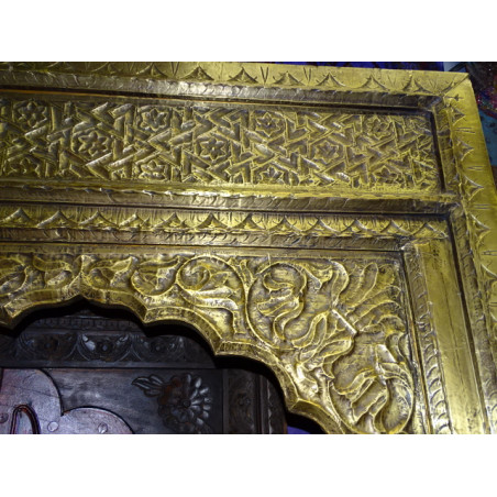 Large Indian arch covered with pressed brass foil