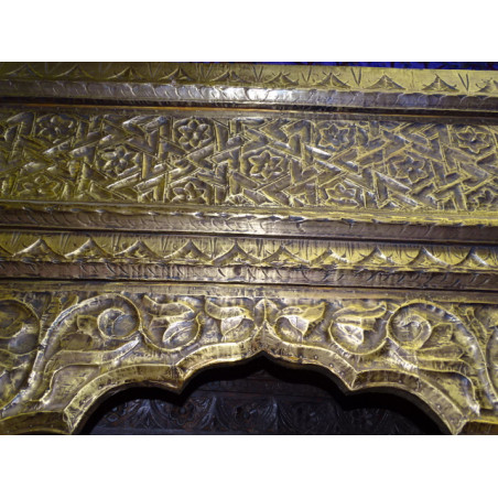 Large Indian arch covered with pressed brass foil