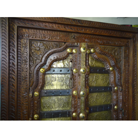 Old cabinet doors decorated with elephant motifs brass plates
