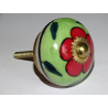 Spring green drawer or door knobs and red flower