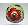 Spring green drawer or door knobs and red flower