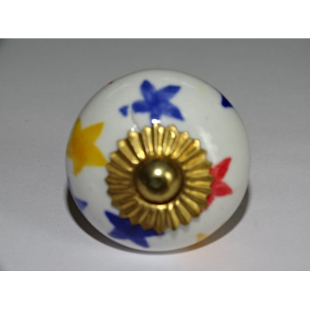 White drawer or door knobs and multicolored stars