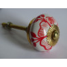 Drawer knobs with red drawn flowers