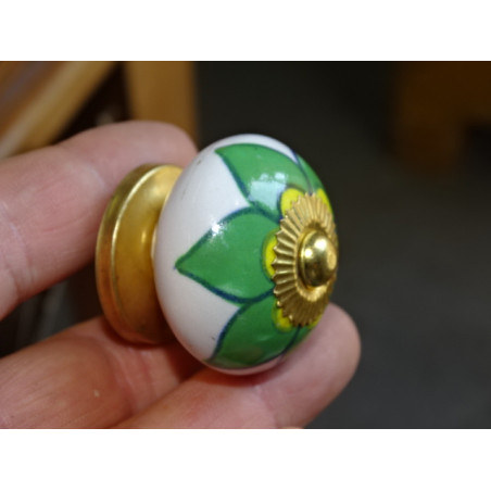 Porcelain drawer or door knobs with green and yellow flower