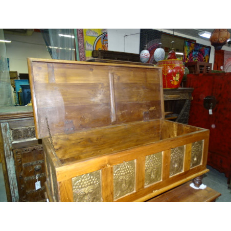 Teak and brass blanket chest with Buddha heads