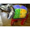 1 elephant with trunk on top and white metal head - GM