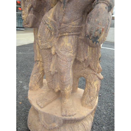 big statue of Devdasi in stone