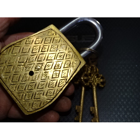 Indian padlock in the shape of a weathered golden owl